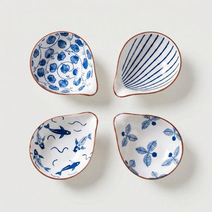 Coastal ceramic dip dishes set of 4 showing assorted blue patterns