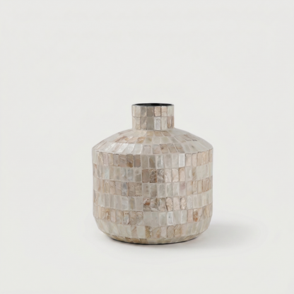 Coastal shell mosaic vase on white background