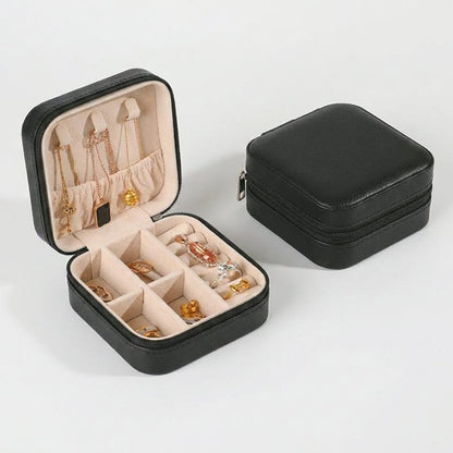 Black jewelry organizer case product photo on a white background