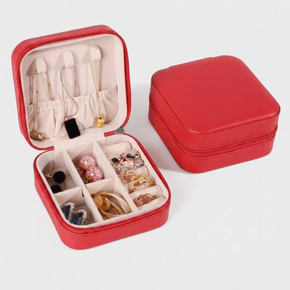Red jewelry organizer case product photo on a white background