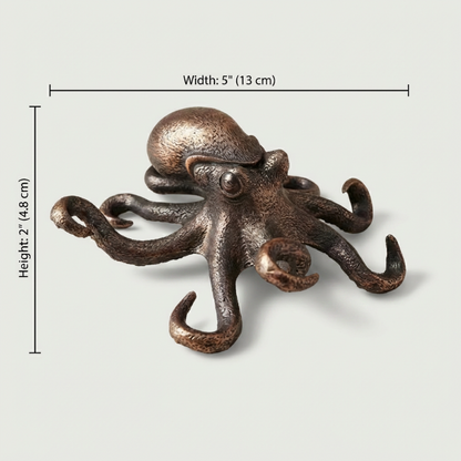 Copper octopus decorative item with dimensions on a light gray background