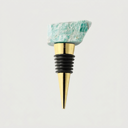 Turquoise crystal wine bottle stopper on white background