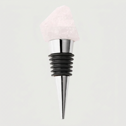 clear quartz crystal wine bottle stopper on white background