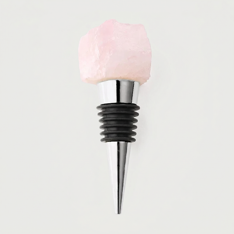 Rose quartz crystal wine bottle stopper on white background
