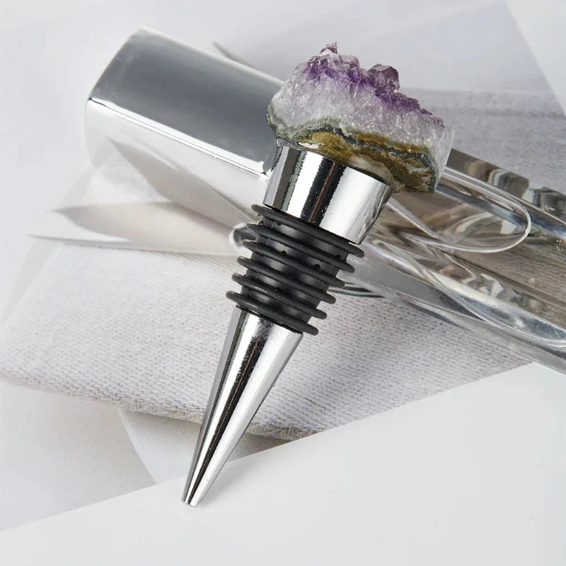 A stylish crystal wine stopper with a smooth, polished finish, designed to preserve wine in an elegant way.