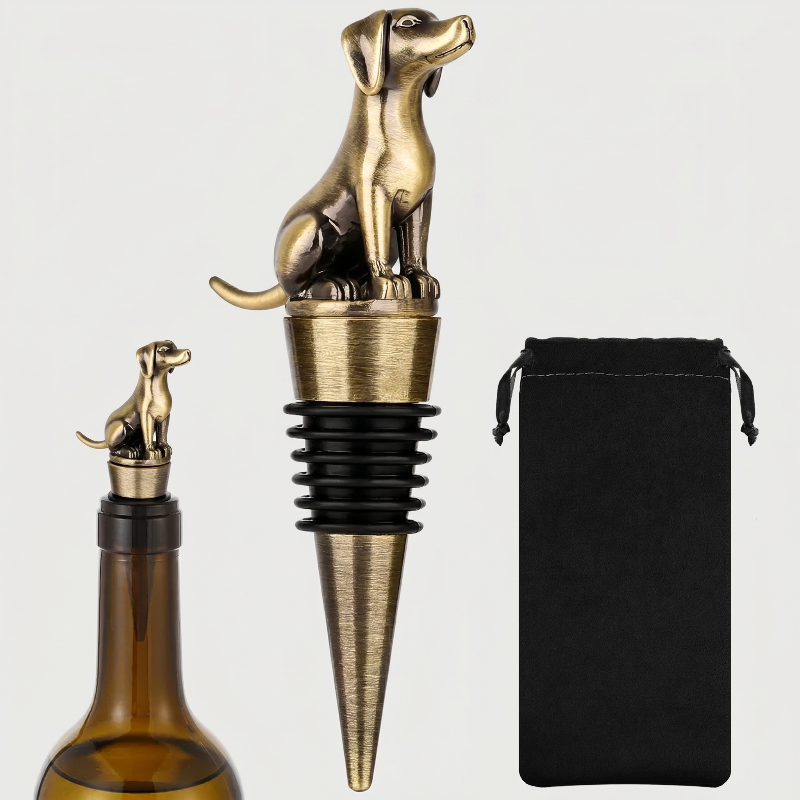 Bronze Labrador dog-shaped bottle stopper with a black pouch on a white background
