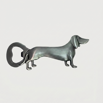 Silver dachshund bottle opener on white background