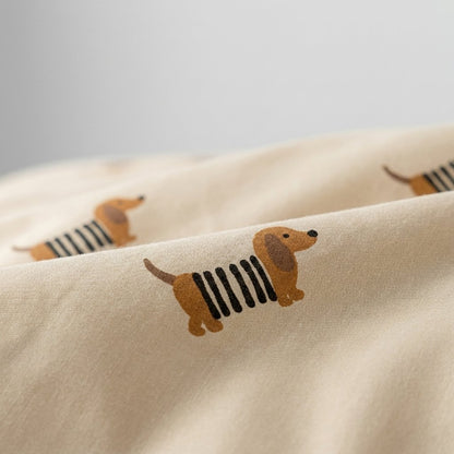 Close-up of the dachshund print fabric showing dogs in black and cream striped sweaters
