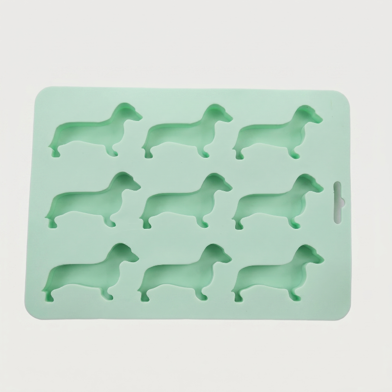 Mint green dachshund ice cube tray on white background