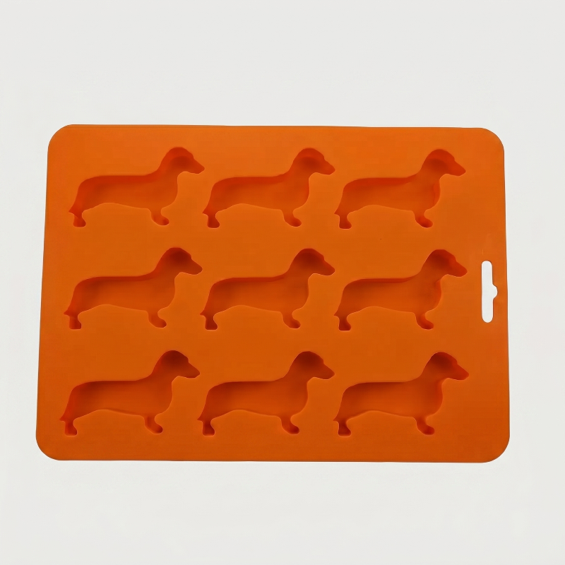 Orange dachshund ice cube tray on white background