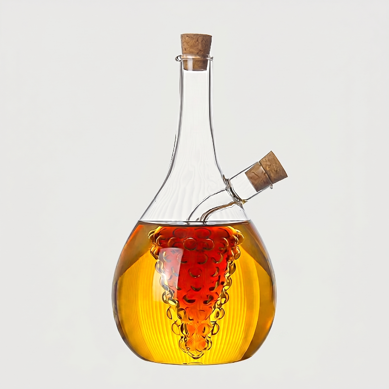 Round dual oil and vinegar bottle on white background with bubbles
