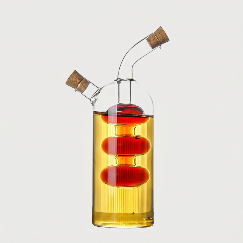 Tall dual oil and vinegar bottle on white background with striped inner chamber