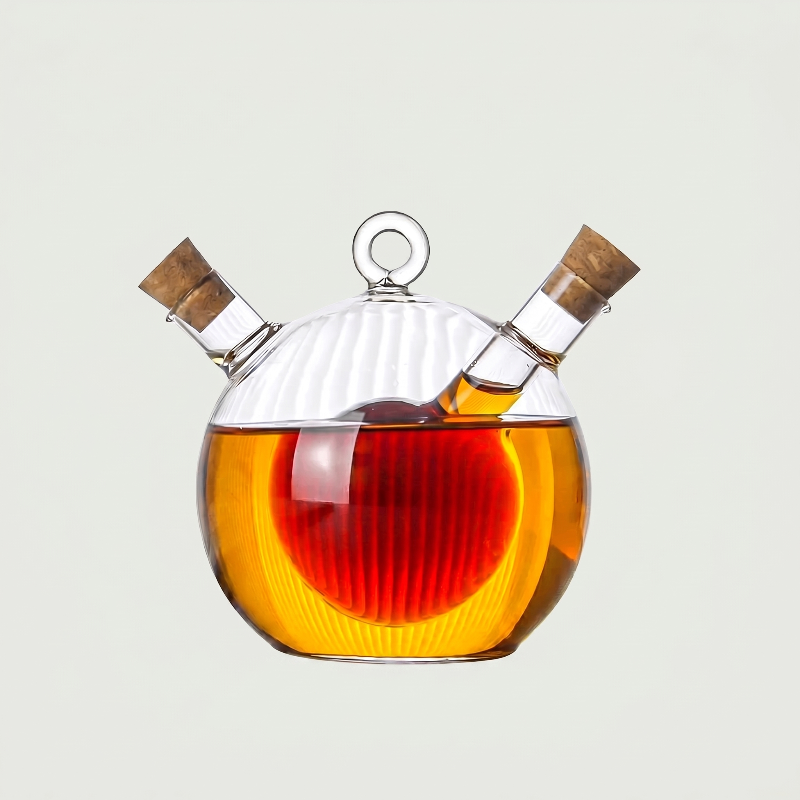 Round dual oil and vinegar bottle on white background