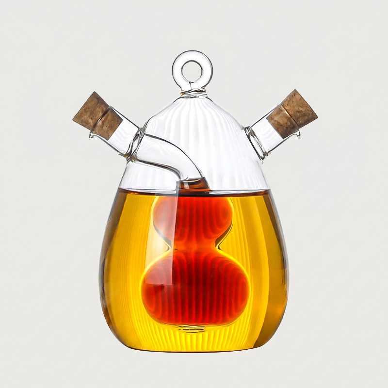 Round dual oil and vinegar bottle on white background showing inner chamber