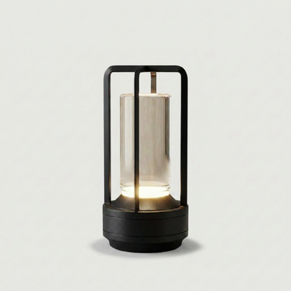 Black Elio cordless metal table lamp on white background