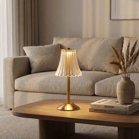 Modern living room with a beige sofa, wooden coffee table, and decorative lamp.