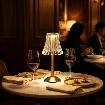 Elysian cordless dimmable table lamp on dining table in warm evening setting