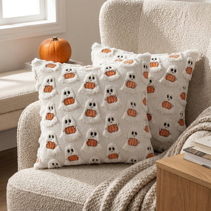 Two Ghost with Pumpkin Fall Halloween Throw Pillow Covers on a boucle armchair