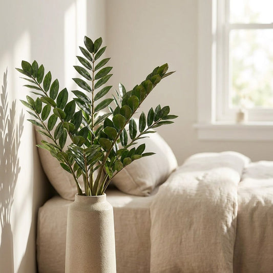 Faux ficus branch stems in a vase on a bedroom nightstand, Kiyo Home