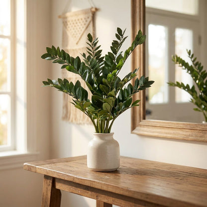 Faux ficus branch stems in a vase on a console table, Kiyo Home