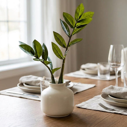 Faux ficus branch stems in a white vase on a dining table, Kiyo Home