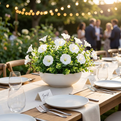 White faux UV-protected flower stems in outdoor dining tablescape