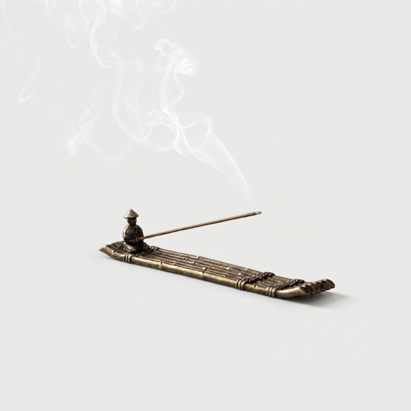 Fishing boat incense burner on white background with smoke