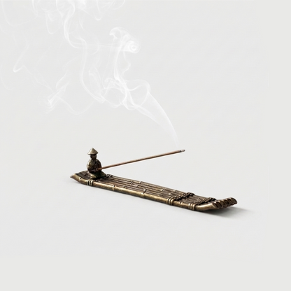 Fishing boat incense burner on white background with smoke
