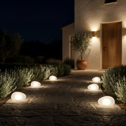 Frosted solar glass pebble lights illuminating walkway at night