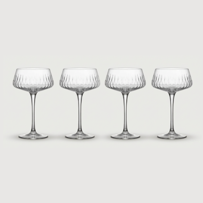 Set of four Garden coupe glasses on white background