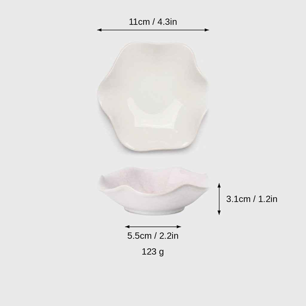 Dimensions graphic of an ivory glazed ceramic dish in top and side views, labeled 11cm / 4.3in wide, 3.1cm / 1.2in high, 5.5cm / 2.2in base and 123 g
