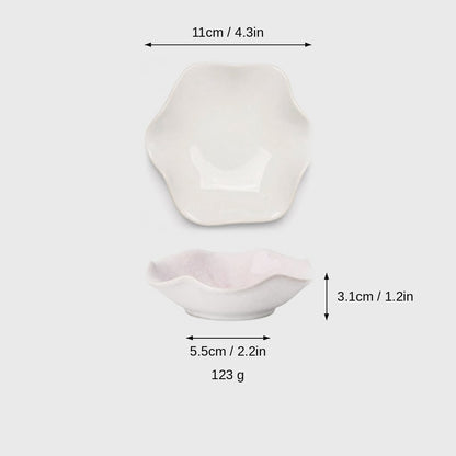 Dimensions graphic of an ivory glazed ceramic dish in top and side views, labeled 11cm / 4.3in wide, 3.1cm / 1.2in high, 5.5cm / 2.2in base and 123 g
