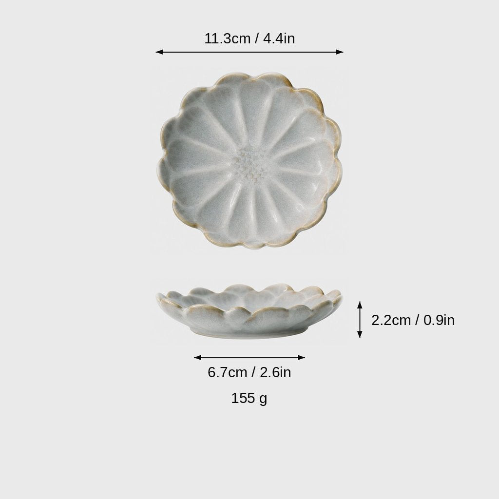Dimensions graphic of a pale gray-beige crackle-glaze scalloped ceramic dish in top and side views, labeled 11.3cm / 4.4in wide, 2.2cm / 0.9in high, 6.7cm / 2.6in base and 155 g