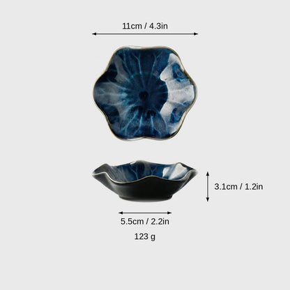 Dimensions graphic of a navy glazed ceramic dish with white-gray streaks in top and side views, labeled 11cm / 4.3in wide, 3.1cm / 1.2in high, 5.5cm / 2.2in base and 123 g