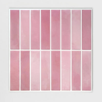 Sheet of dusty rose glossy subway tile on a plain studio background