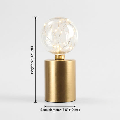 Lit glass globe LED lamp on a plain background with measurements marked: height 8.3 inches, base diameter 3.9 inches