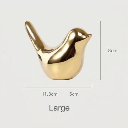 Large gold bird sculpture dimensions graphic on white background