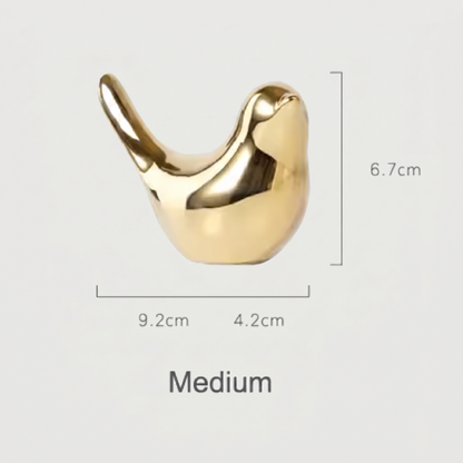 Medium gold bird sculpture dimensions graphic on white background
