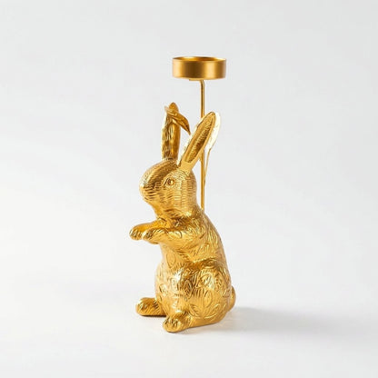 Standing gold rabbit candle holder with tealight cup on tall stem