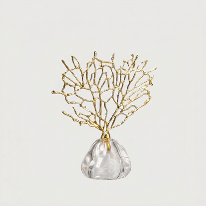 Gold coral sculpture on white background