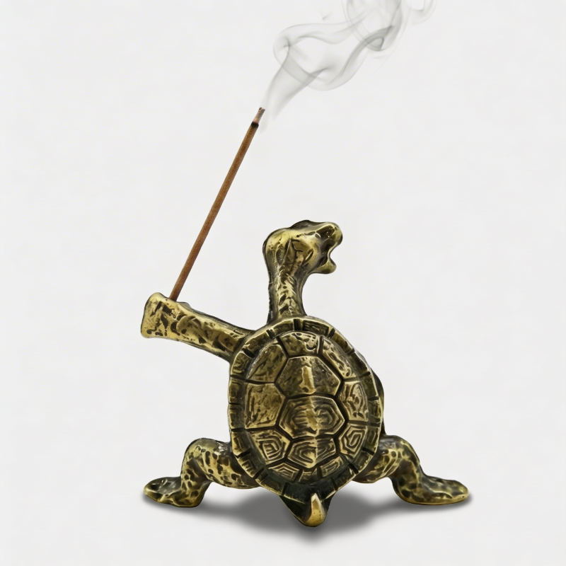 Green turtle incense holder isolated on white background