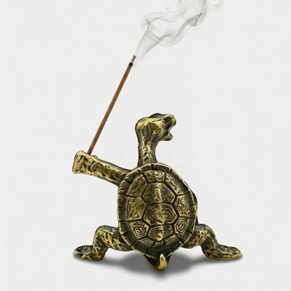Green turtle incense holder isolated on white background