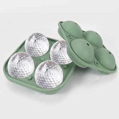Green golf ball ice mold tray on white background with molded ice balls