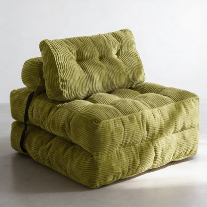 Green corduroy sofa bed on a white background