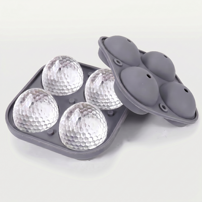 Grey golf ball ice mold tray on white background with molded ice balls