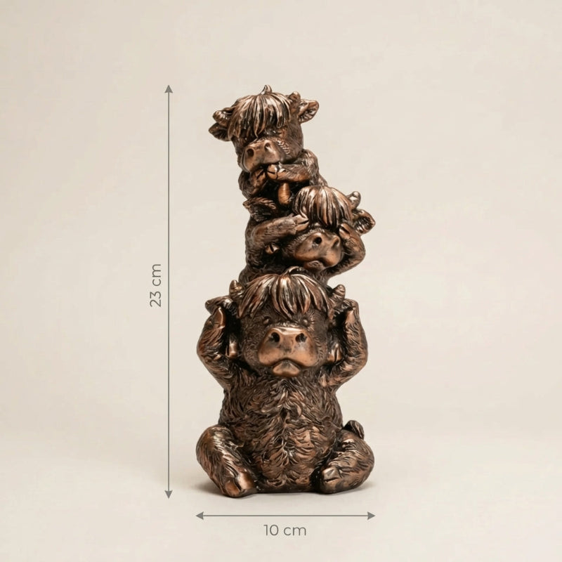 Bronze sculpture of three bears stacked on top of each other with measurements indicated.