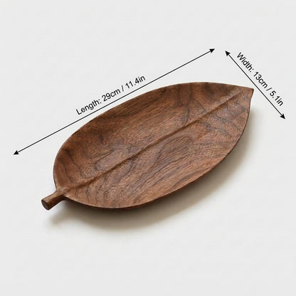 Small elliptical walnut leaf tray labeled 29 cm long and 13 cm wide