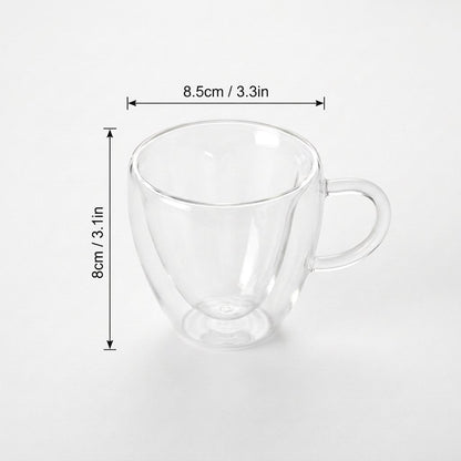 Small heart-shaped glass mug on a plain background with measurements marked: height 3.1 inches, width 3.3 inches