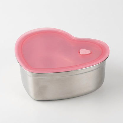 Heart-Shaped Stainless Steel Food Container with pink silicone lid shown from an angled overhead view