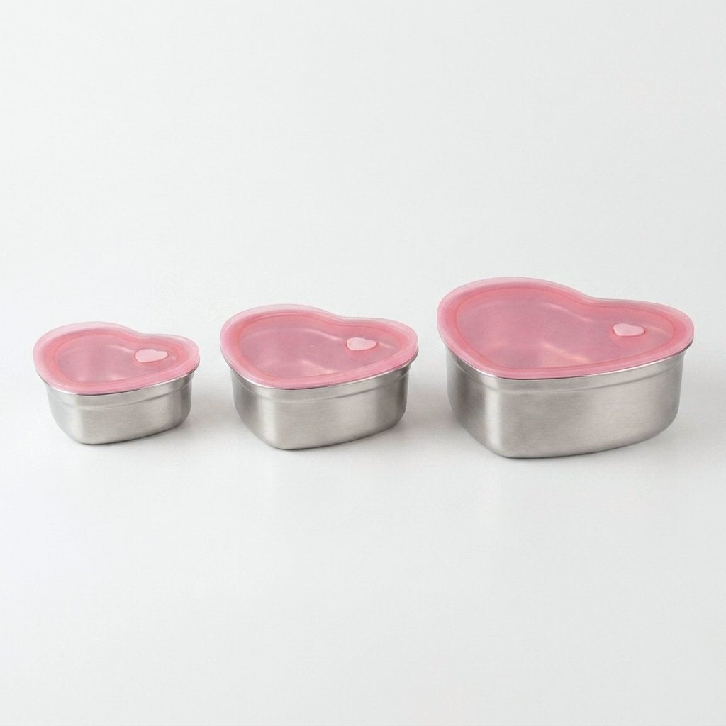 Heart-Shaped Stainless Steel Food Containers shown side by side in three sizes on a plain background